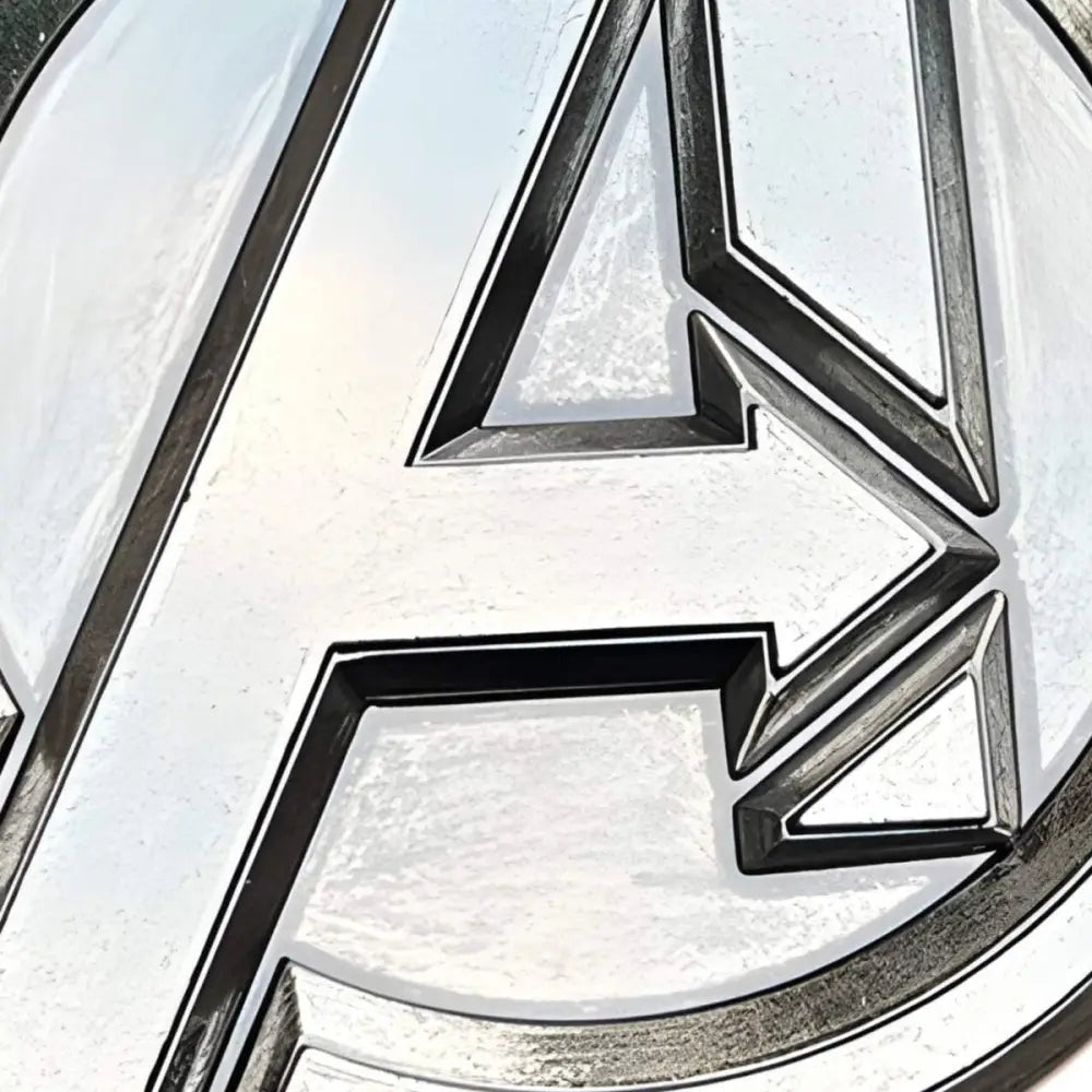 Silver Avengers logo belt buckle for Marvel fans featuring the iconic superhero emblem