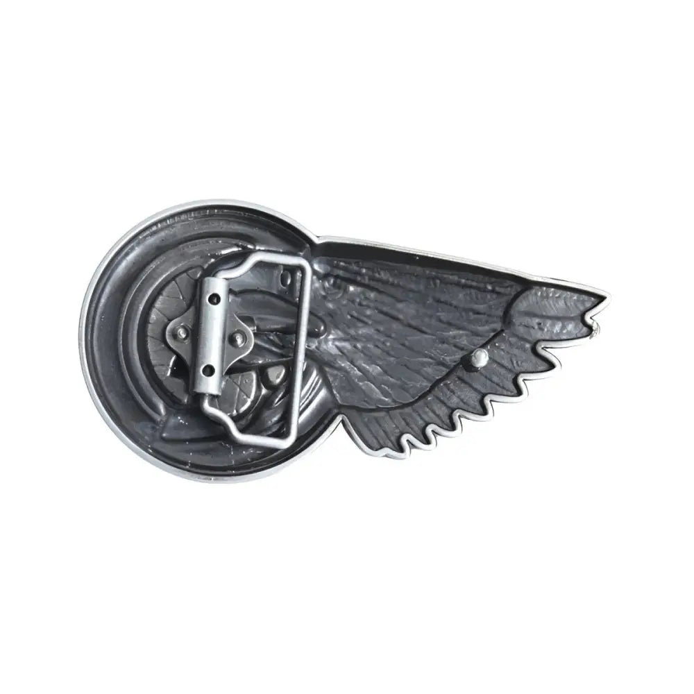 Silver winged belt buckle featuring an eagle skull design for motorcycle enthusiasts