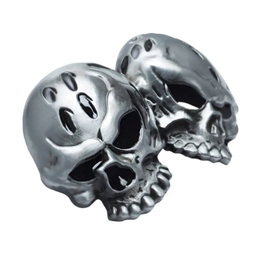 Elvan Double Skull belt buckle featuring two silver skull-shaped designs for a bold style