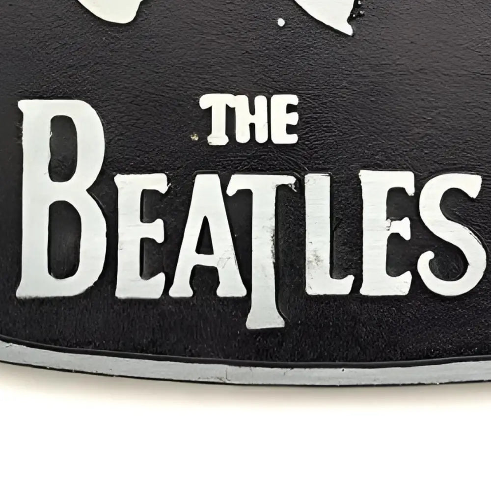 The Beatles sign belt buckle for fans of classic rock accessories