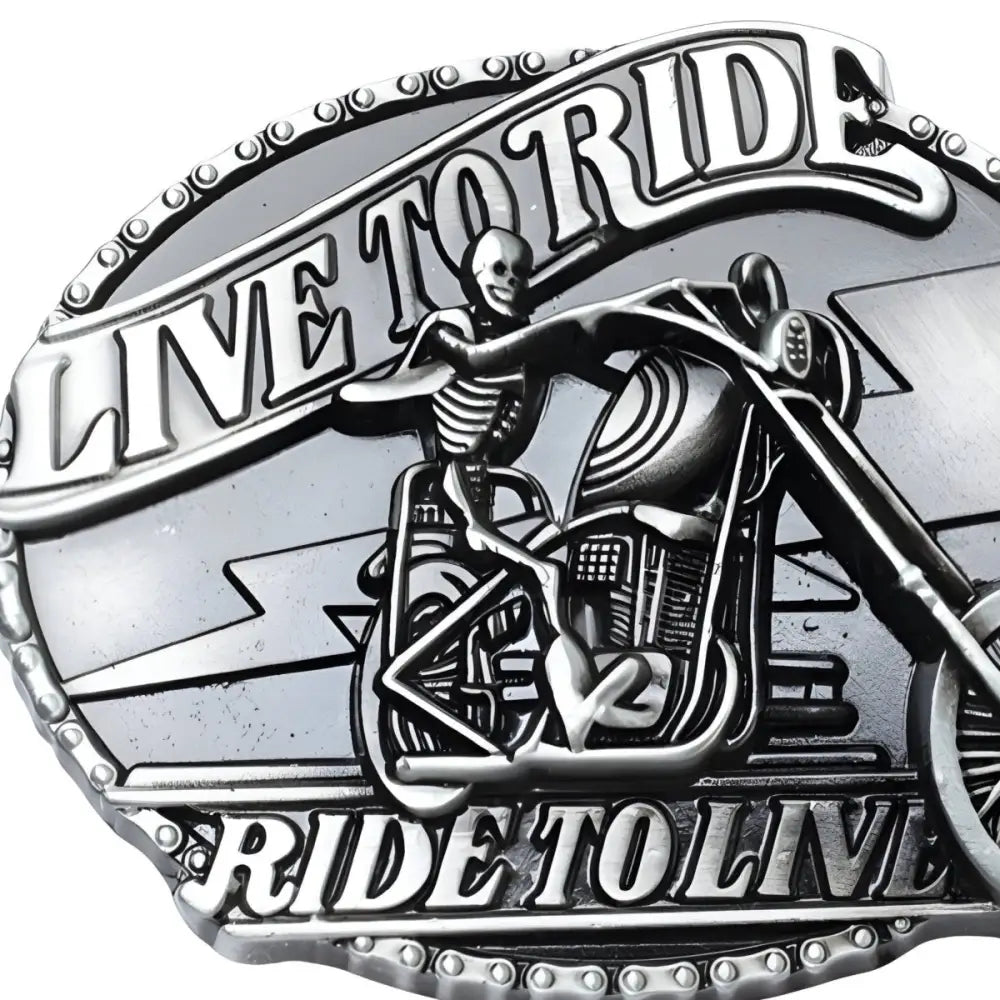Silver motorcycle belt buckle displayed on stylish men’s and women’s belt accessory