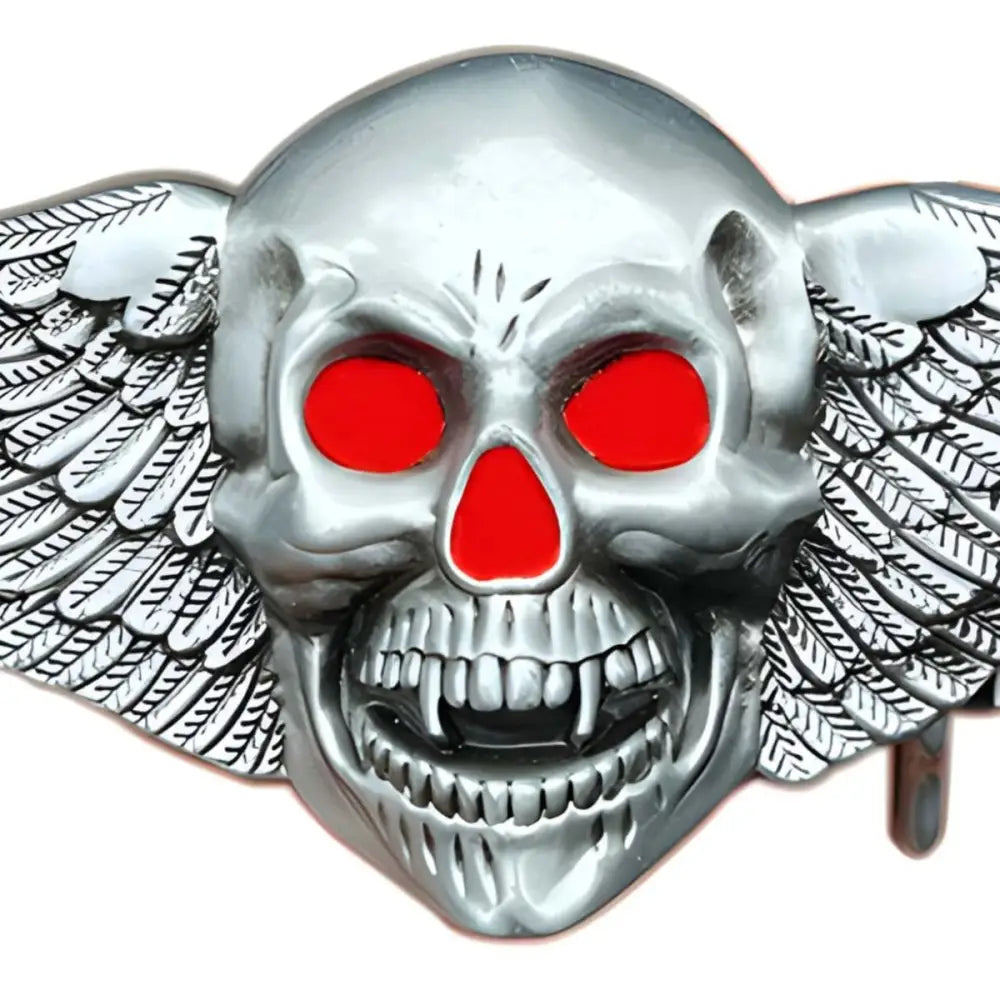 Silver skull belt buckle with red eyes and wings, gothic fashion accessory