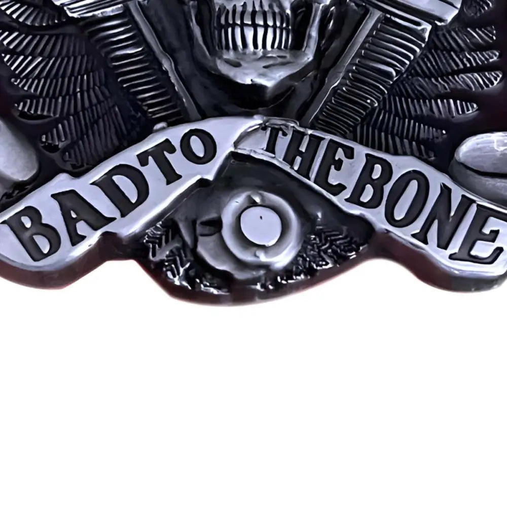 Silver skull with wings emblem belt buckle, stylish and rugged accessory for men