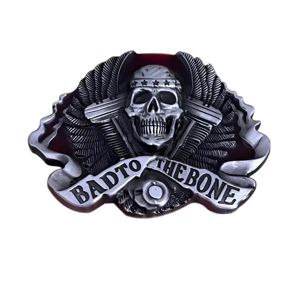 Silver skull with crossed guns and wings belt buckle for a bold accessory look