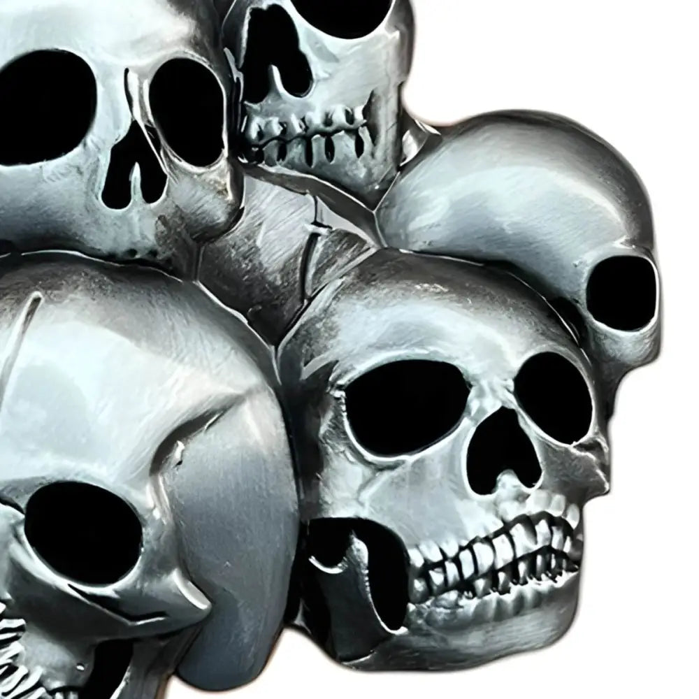 Silver Skull Belt Buckle symbolizing collective strength with a pile of silver skulls