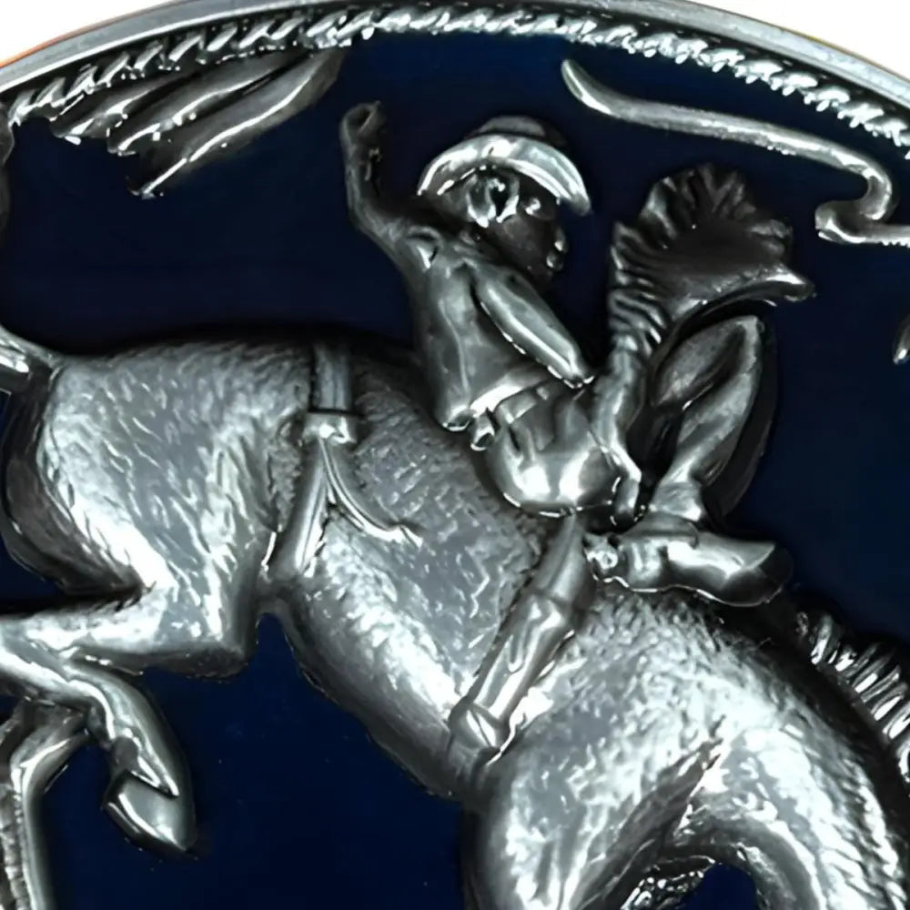 Silver cowboy riding a bucking horse oval belt buckle for Western fashion accessories