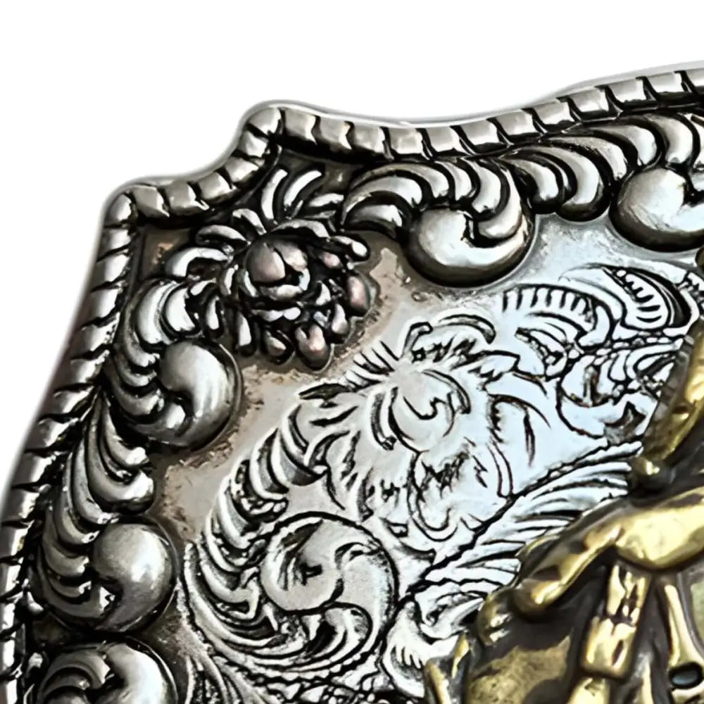Ornate silver belt buckle corner inspired by American West style for Western attire