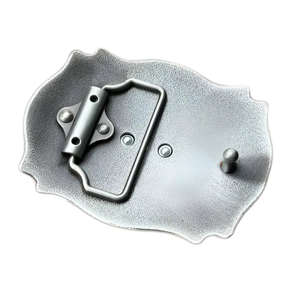 Metal belt buckle back featuring ornate design inspired by American West style