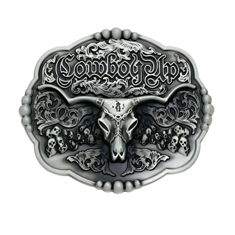 Silver cowboy belt buckle featuring a longhorn skull and ornate design