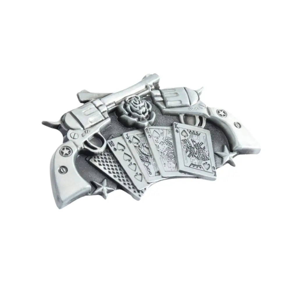 Silver-colored belt buckle with guns and playing cards for an adventurous spirit