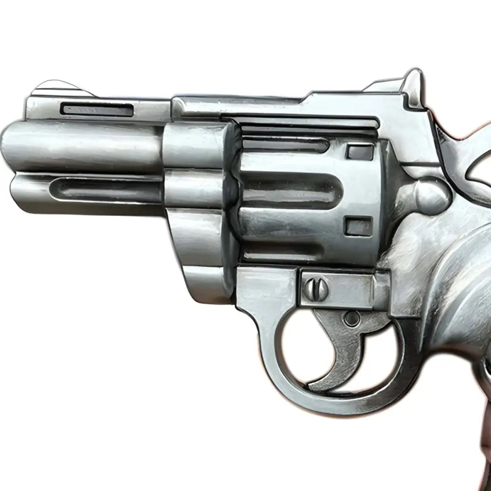Silver-colored revolver belt buckle with skull handle for stylish accessories