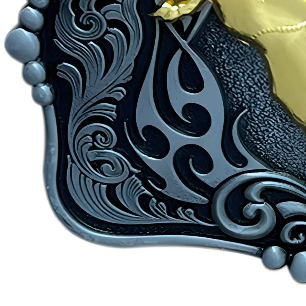 Ornate corner of Gold Rodeo Epic belt buckle showcasing intricate metal detailing