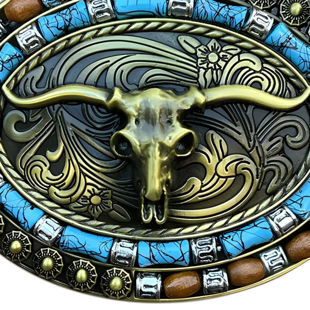 Oval belt buckle with steer skull design for Western style fashion and accessories