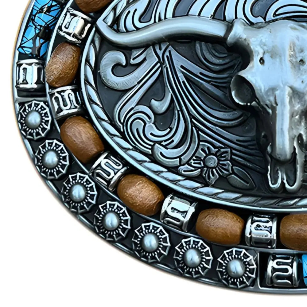 Western-style belt buckle featuring a steer skull design for authentic western fashion