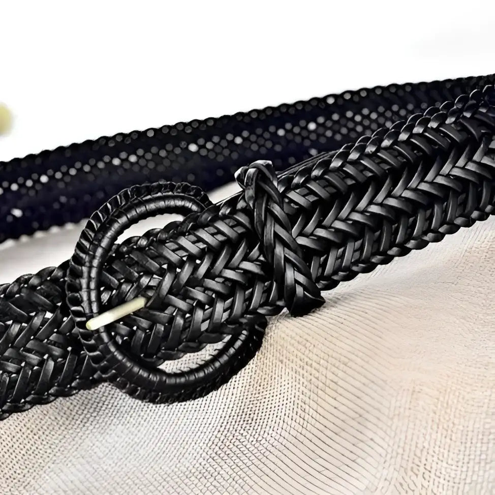 Braided black leather belt with a circular buckle displayed with the Braided Brown Leather Belt product