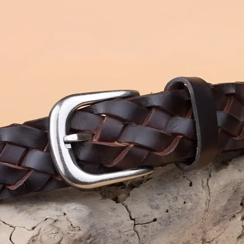 Braided brown leather belt with a silver buckle for men’s fashion accessory
