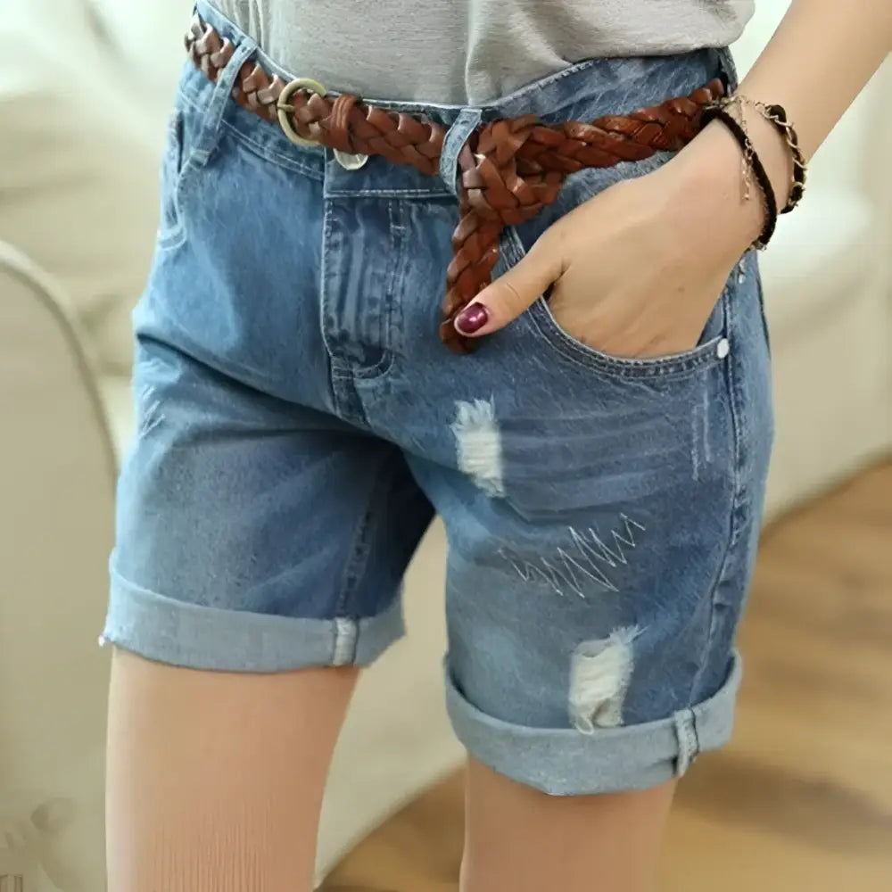 Distressed denim shorts paired with a braided Burgundy and Brown Leather Belt