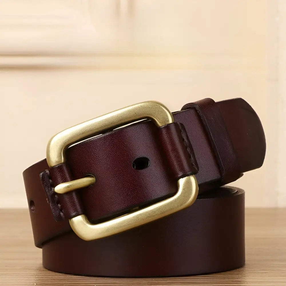 Brown leather belt with brass and gold buckle for a sophisticated accessory look