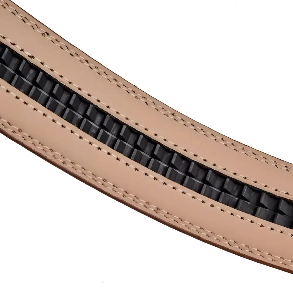 Brown leather belt with geometric buckle and black ratchet track for adjustable fit