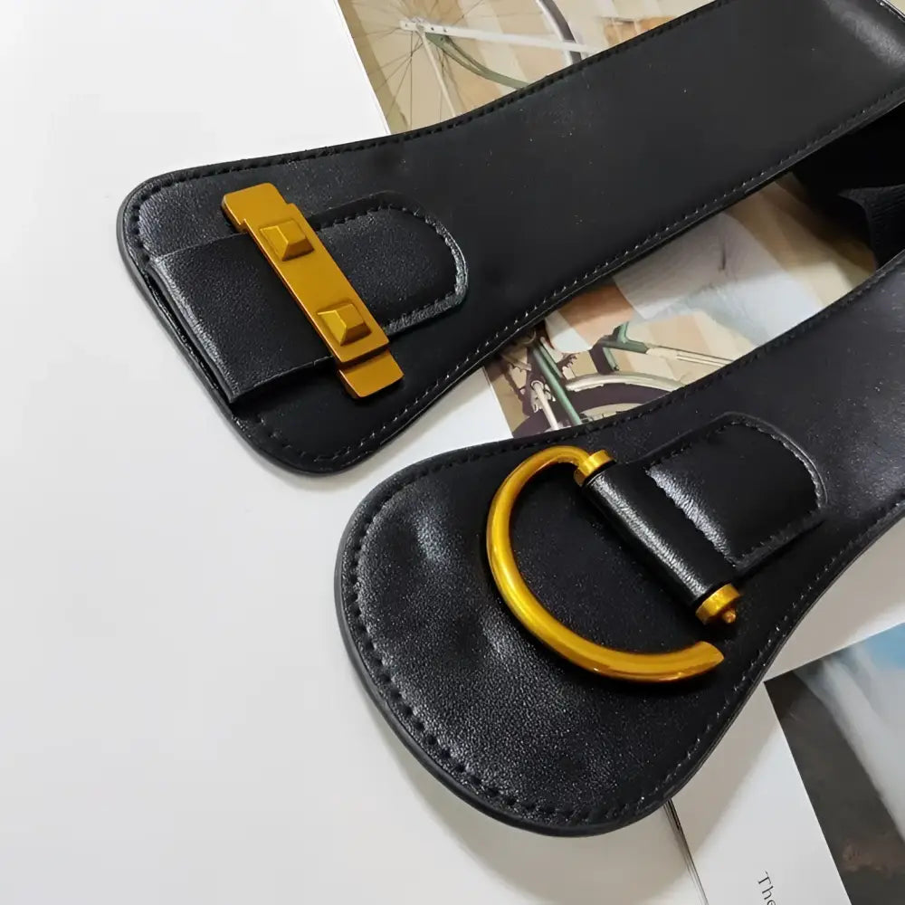 Black leather belts with gold hardware featured in the Brown Leather Belts and Teddy Bear Coat product