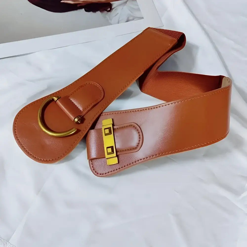 Brown elastic waist belt with gold hardware shown with Teddy Bear Coat and Brown Leather Belts