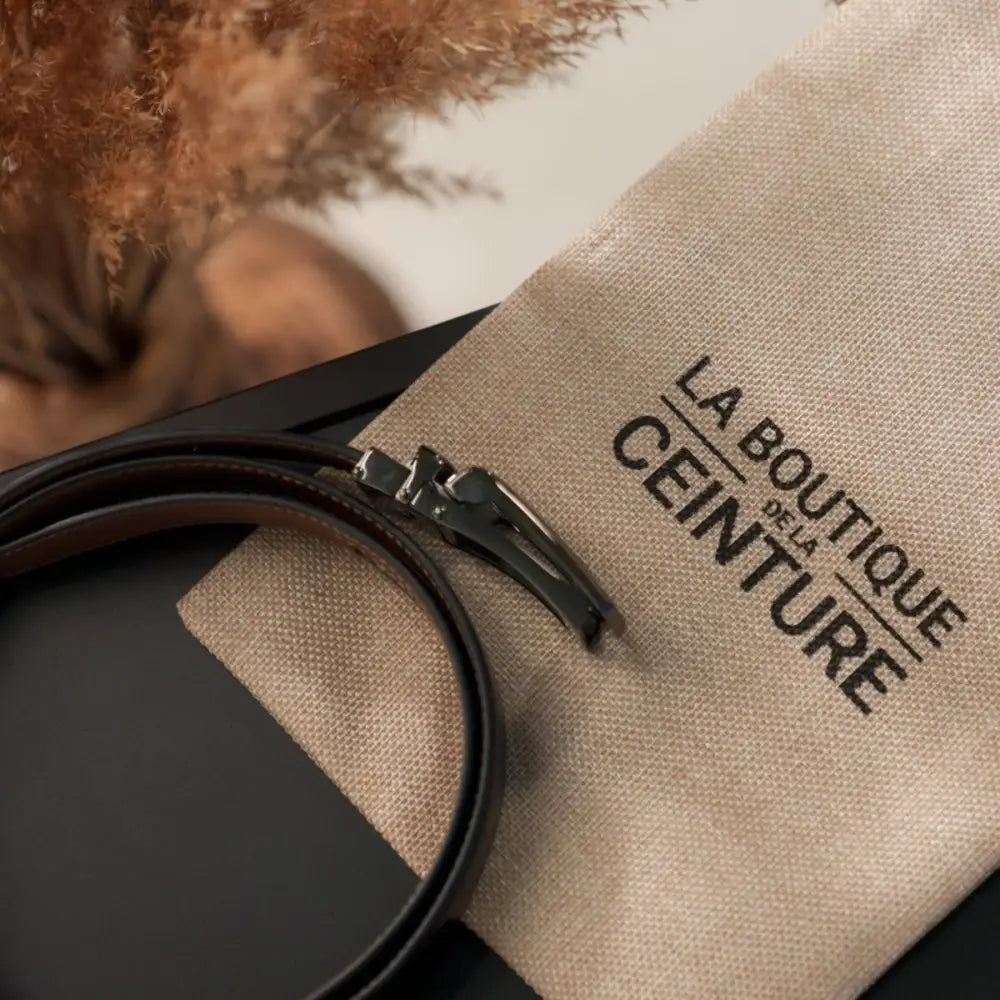 Brown Leather Ratchet Belt for Men with a Branded Pouch exhibiting high-quality craftsmanship