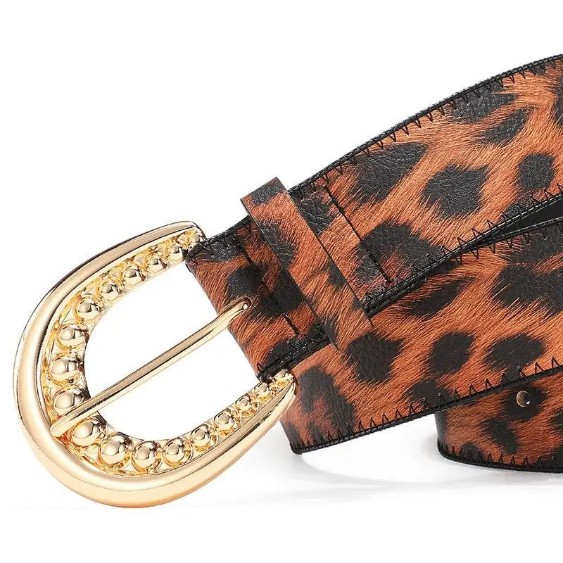 Leopard print belt with gold buckle accessory for stylish fashion ensembles