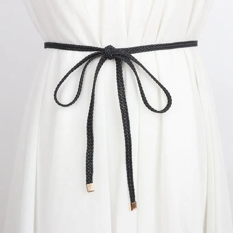 Braided black belt tied in a bow for a classic look on a brown belt product