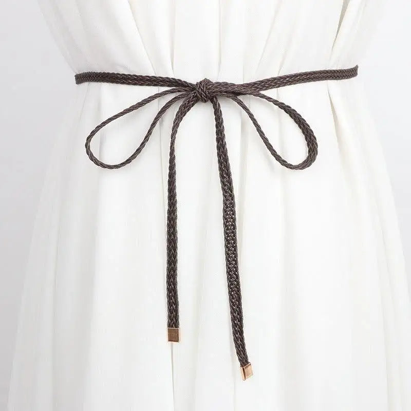 Braided brown belt tied in a bow for a classic look displayed with the product named Braided Brown Belt with Tie Bow for a Classic Look