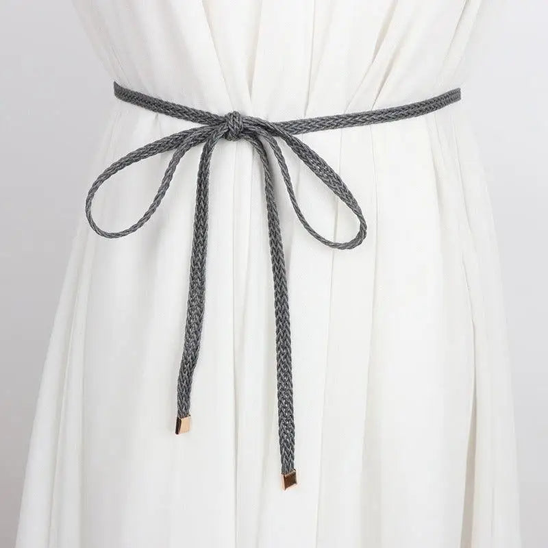 Braided gray belt tied in a bow, complementing the classic look of the Brown Belt with Tie Bow