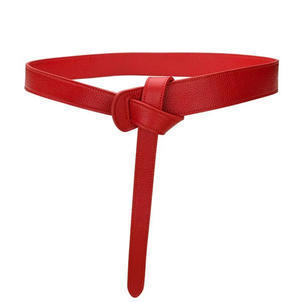 Red leather belt with knot from Houndstooth Blazer showcasing Thiphilia Tie Belt design