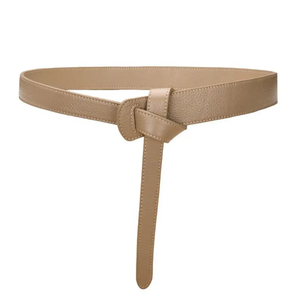 Beige leather tie belt from the Thiphilia Tie Belt collection displayed with Houndstooth Blazer