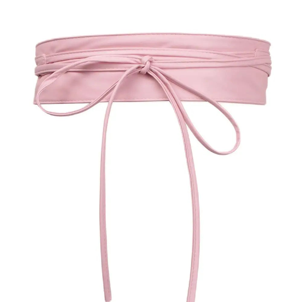 Pink leather obi belt featured with Red Floral Dress and Isabel Belt accessory