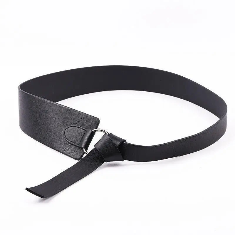 Black leather tie belt with metal ring from Thanusa Tie Belt collection for stylish formal wear