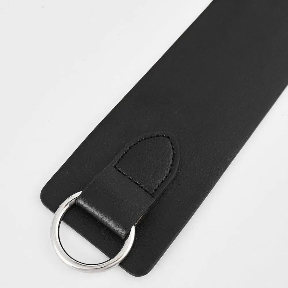 Black leather tie belt with metal ring from Thanusa Tie Belt for stylish formal wear