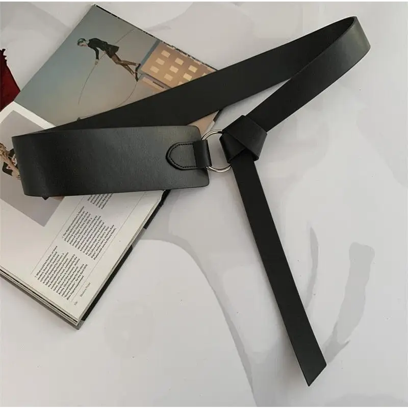 Black leather tie belt with metal ring from Thanusa Tie Belt for stylish formal wear