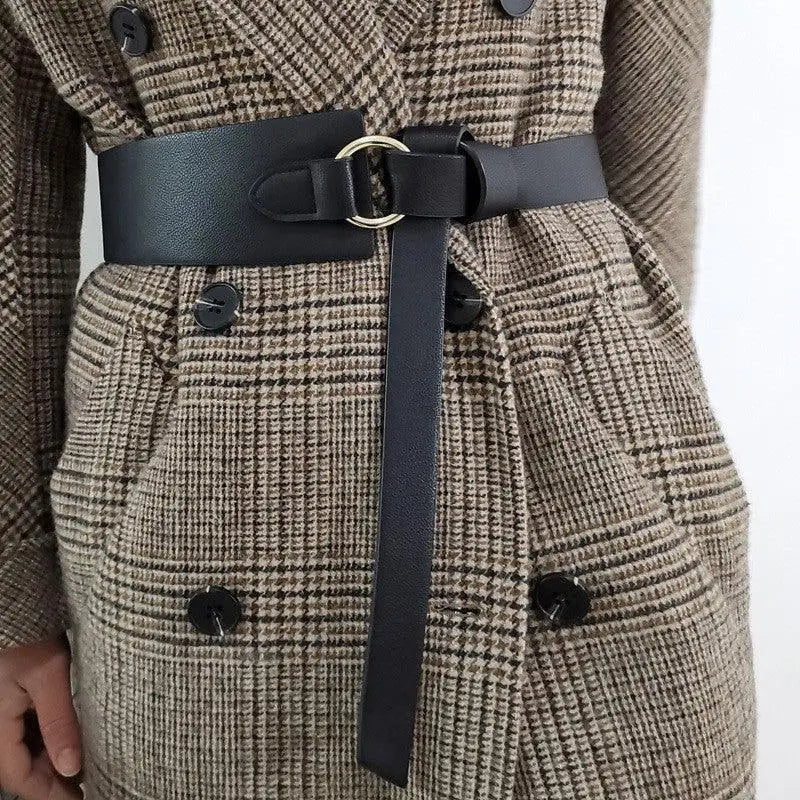 Black leather Thanusa Tie Belt with gold ring for stylish formal wear