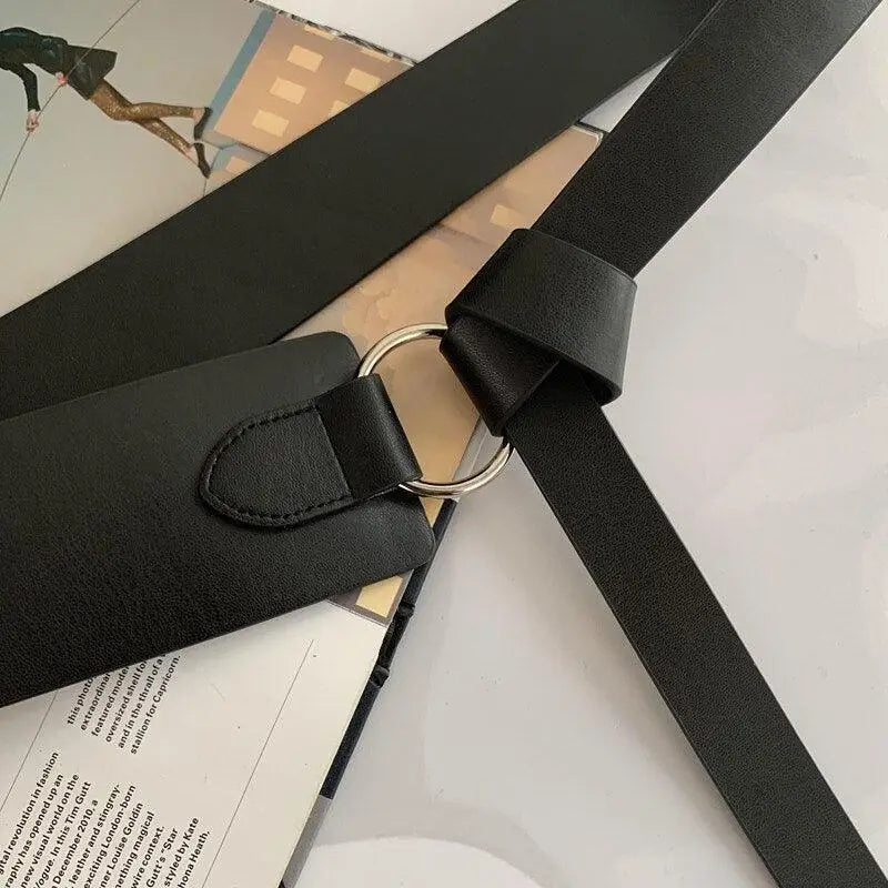 Black leather tie belt with silver ring from Thanusa Tie Belt for stylish formal wear