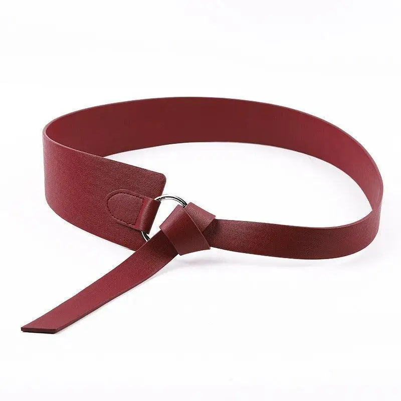Maroon leather tie belt with metal ring from Thanusa Tie Belt collection for stylish formal wear