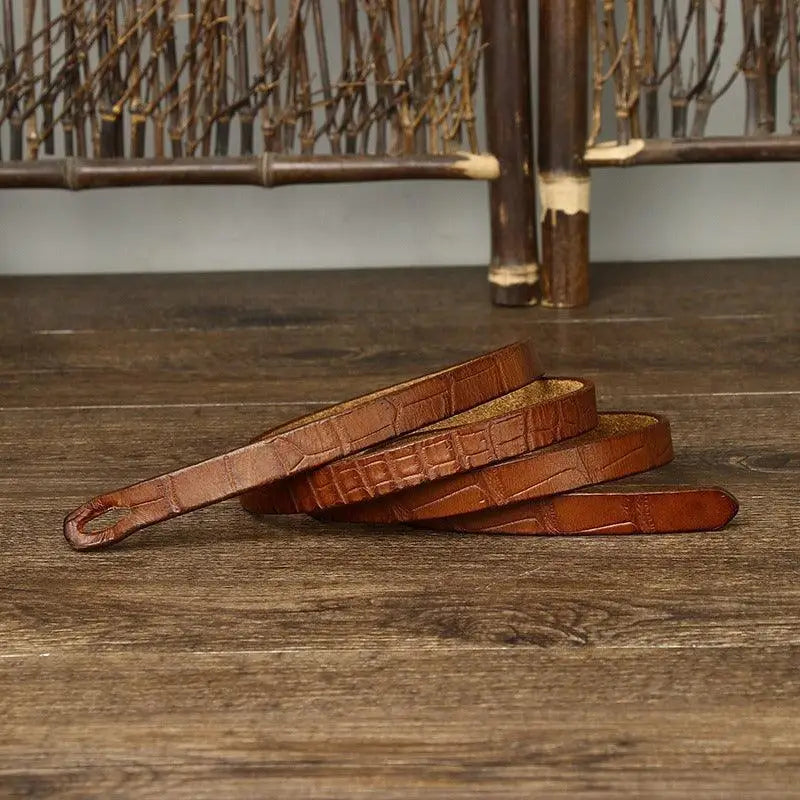 Brown crocodile-patterned leather tie belt for Belt Ubredice product display