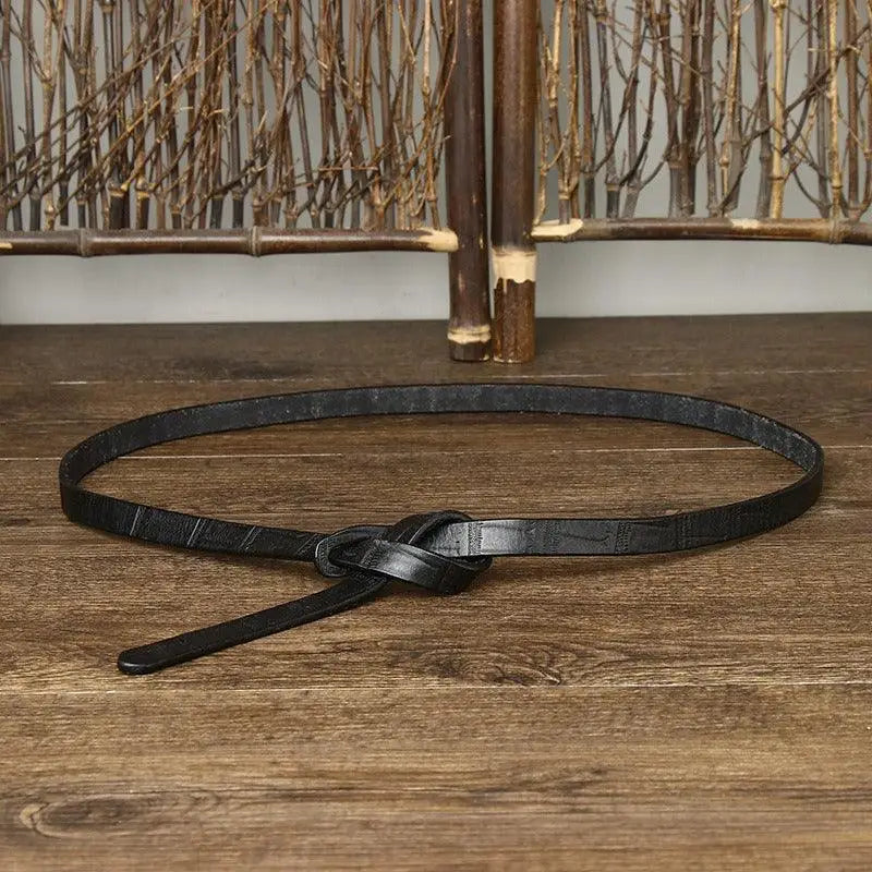 Black leather knotted tie belt displayed in Assorted Faux Crocodile Leather Tie Belts and Belt Ubredice