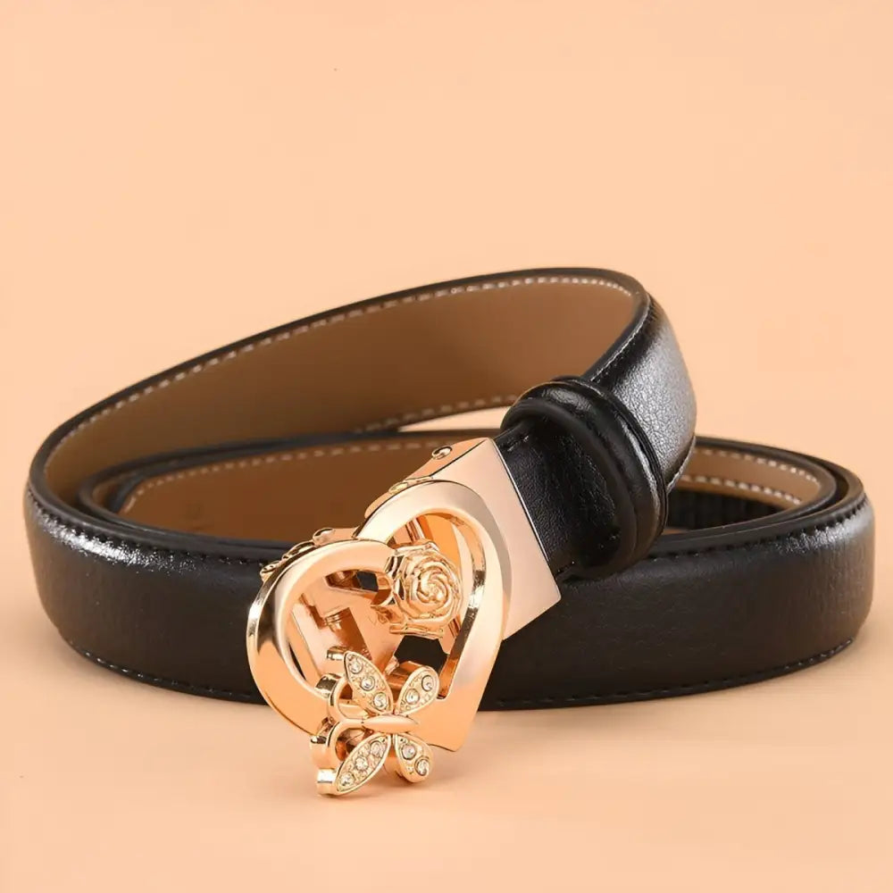 Black leather belt featuring a heart-shaped buckle and gold accents