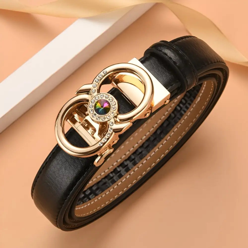 Red leather belt with jeweled gold buckle displayed in a product image