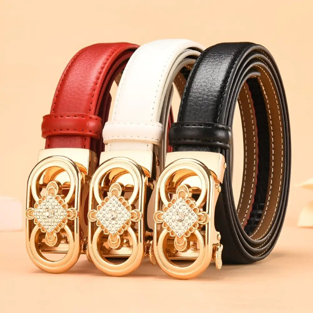 Set of three leather belts with jeweled and gold buckles for stylish accessorizing