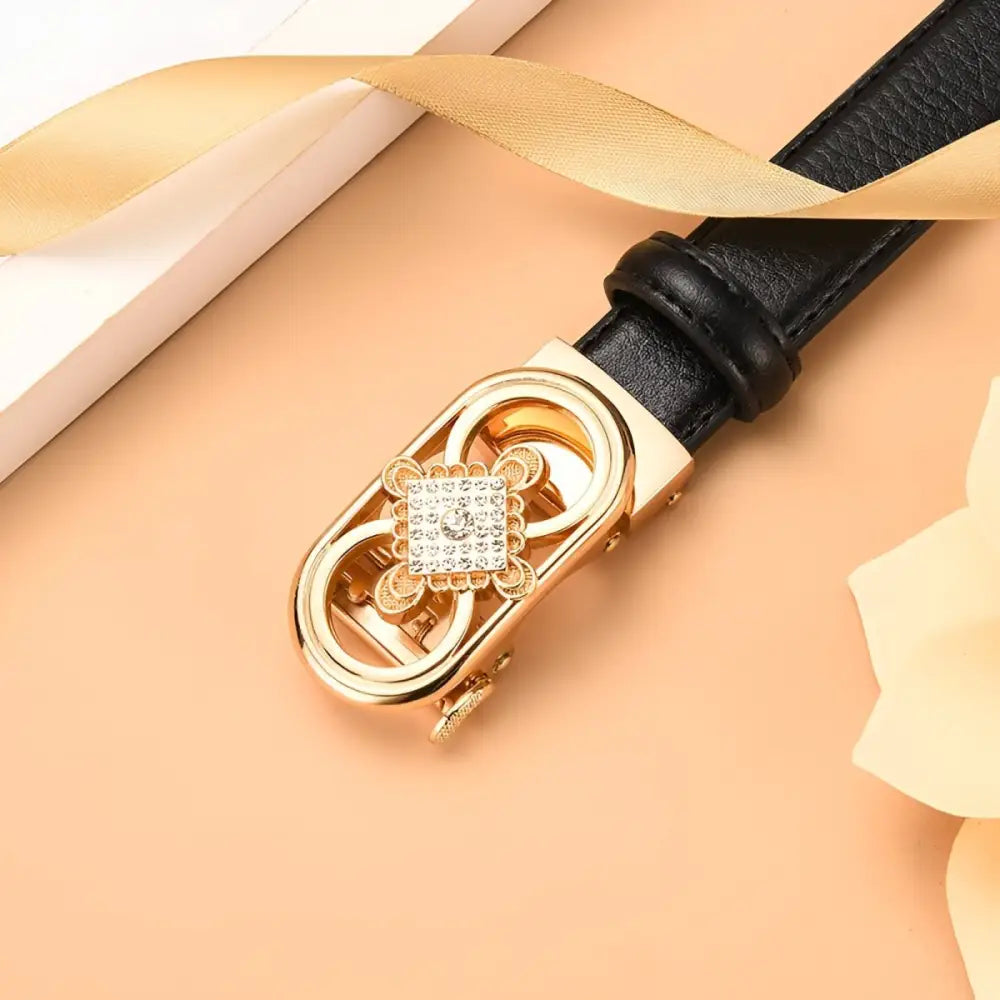 Black leather belt featuring a gold decorative buckle from the Set of Three Leather Belts with Jewel-Embellished and Gold Buckles