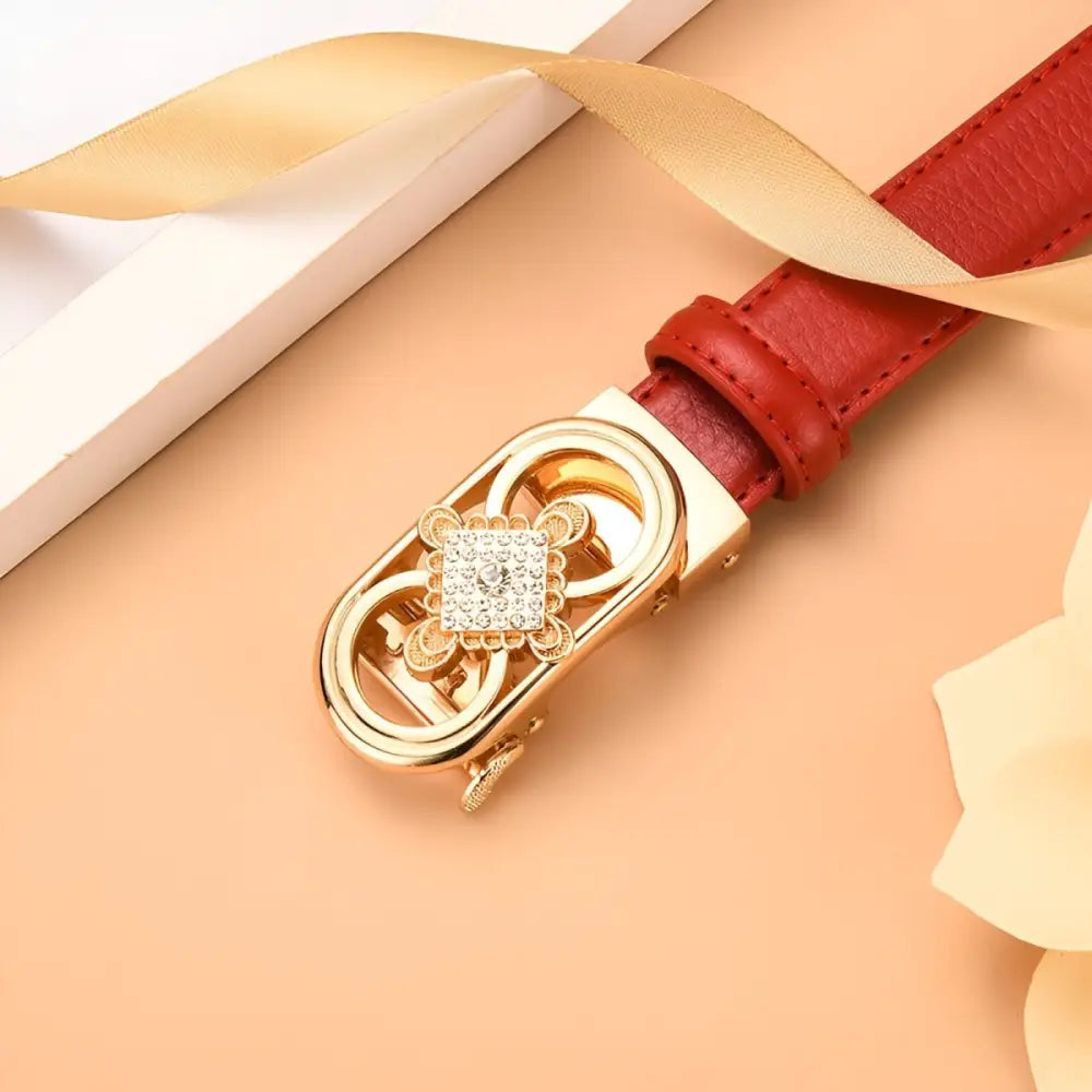 Red leather belt with jeweled gold buckle from set of three leather belts