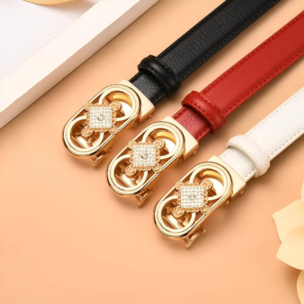 Set of three leather belts with jeweled and gold buckles for stylish accessories