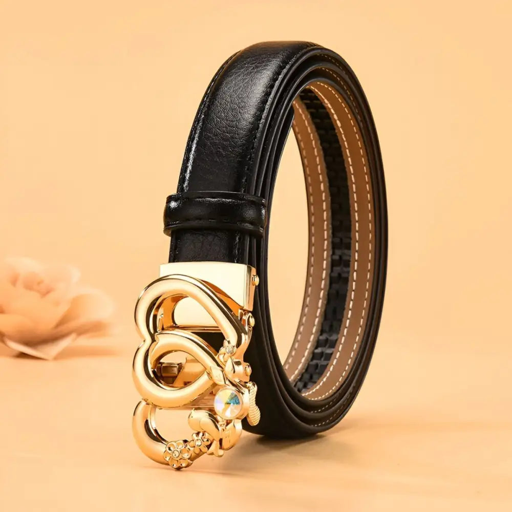 Automatic leather belt with gold heart-shaped buckle showcasing elegant black leather style