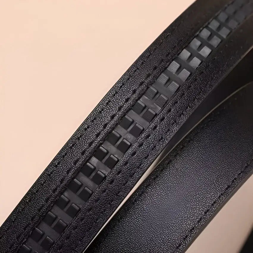 Automatic leather belt with textured black leather and gold heart-shaped buckle