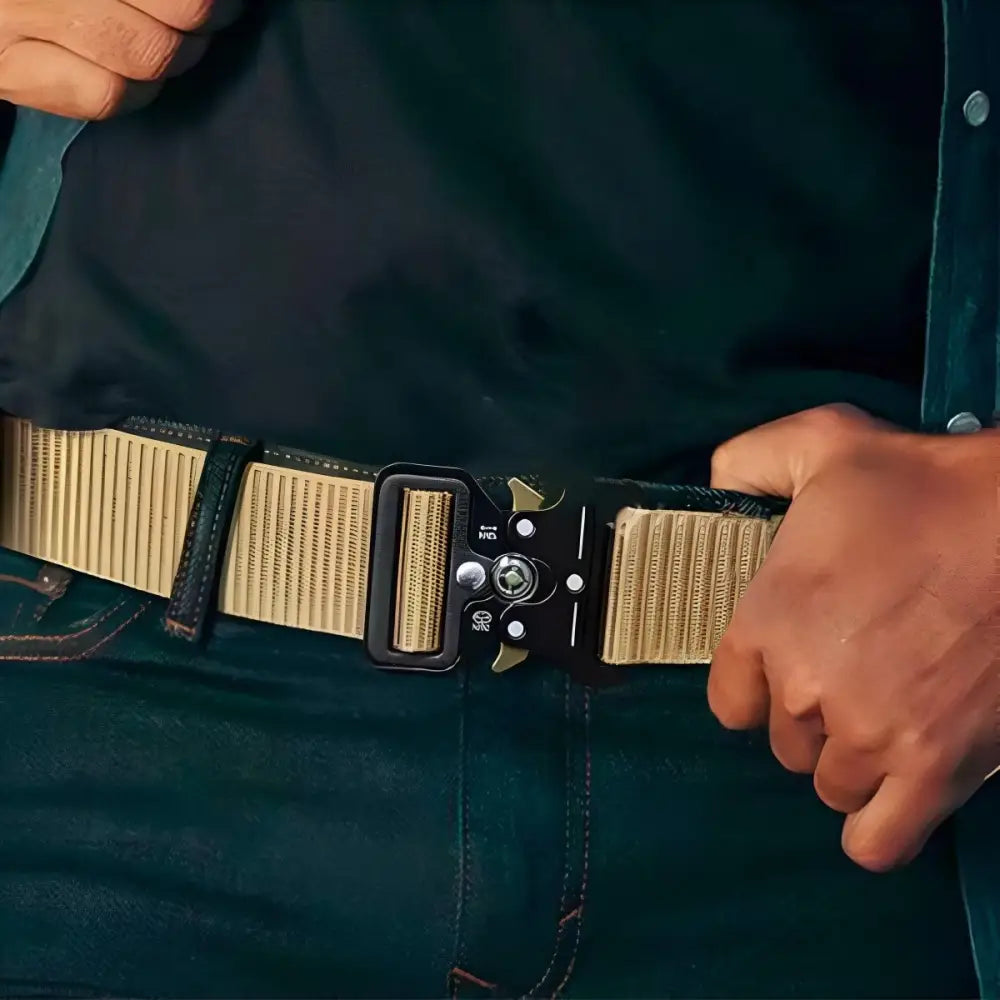 Tan tactical belt with black metal buckle shown in product image